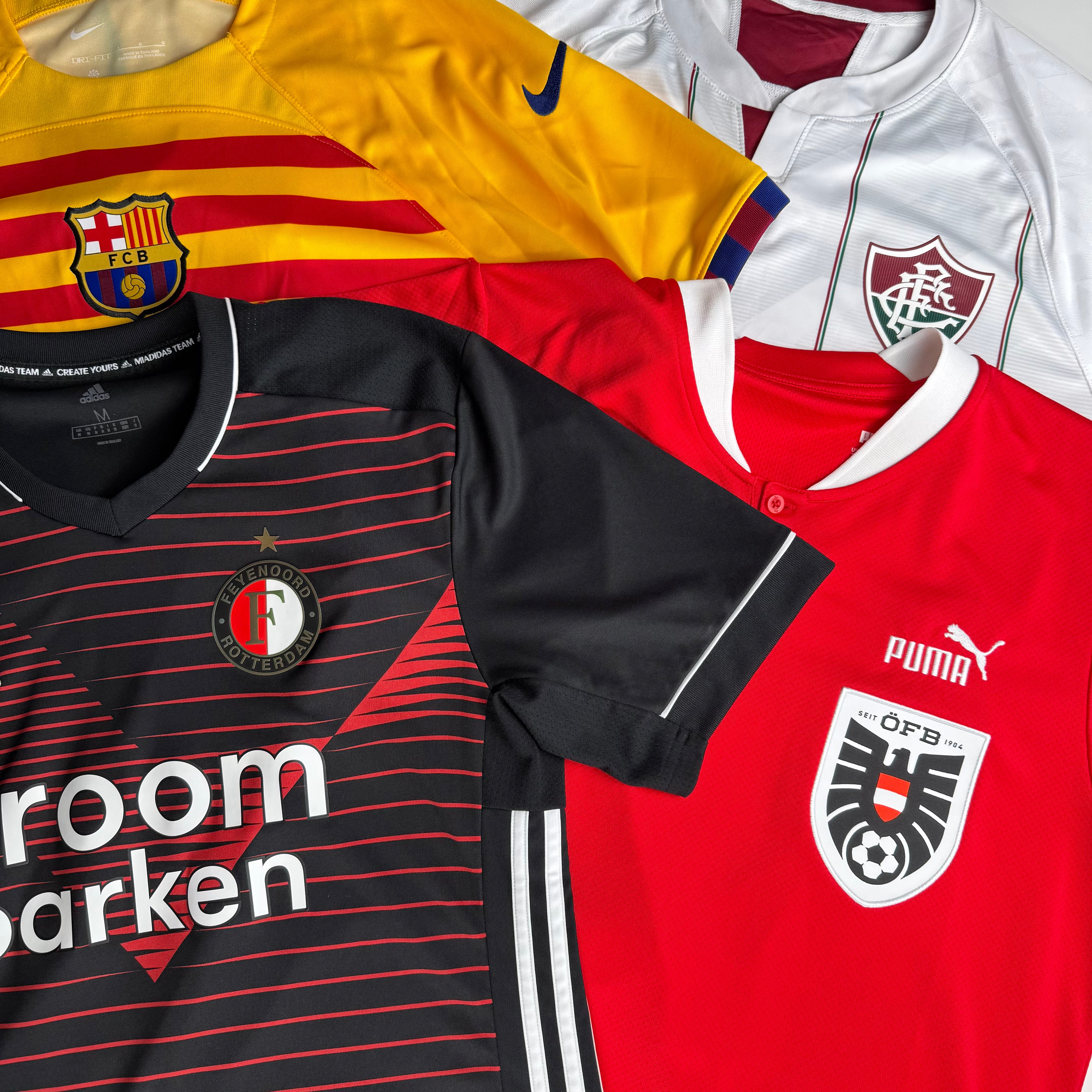 Authentic Football Club Classic Edition mystery box with various football-themed items inside.